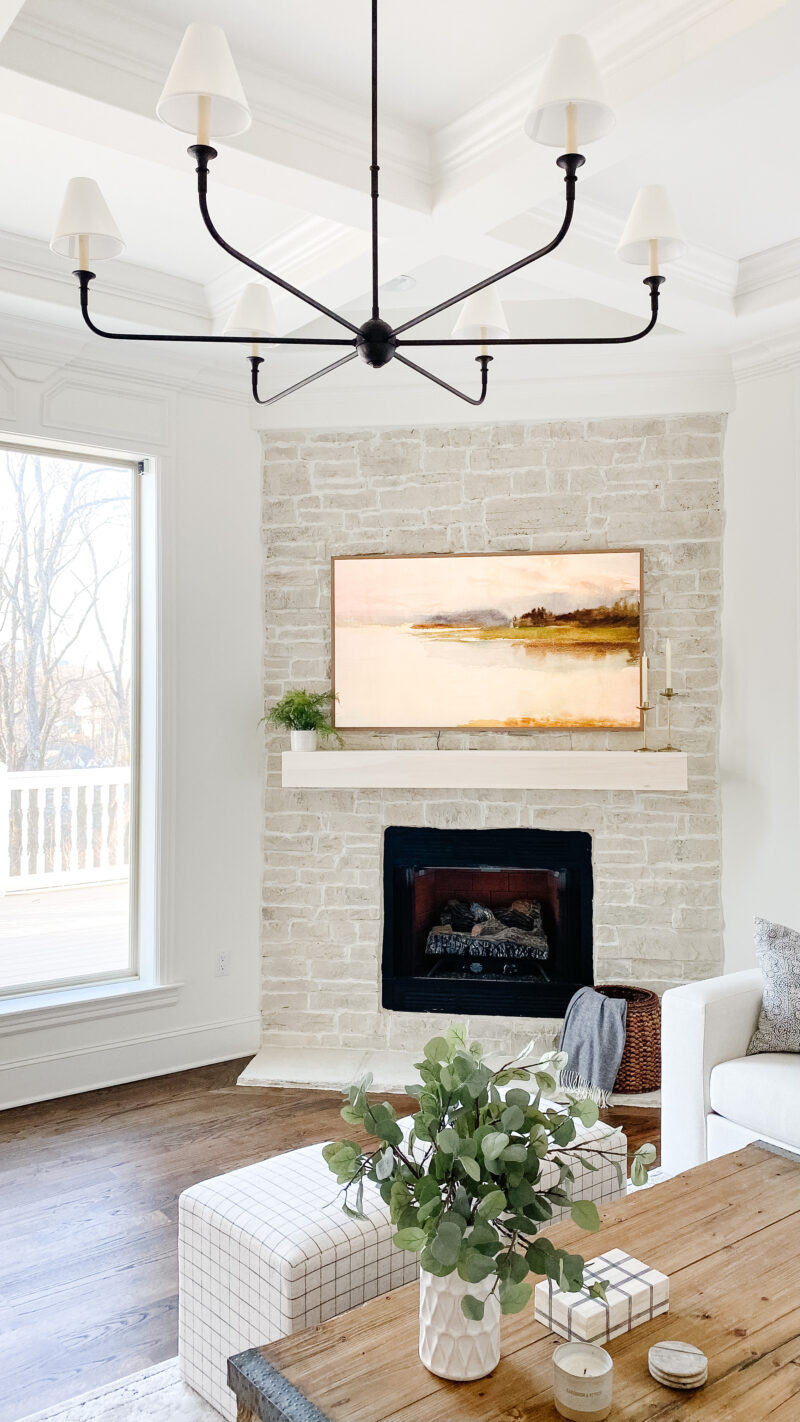 stone tile fireplace in dining room