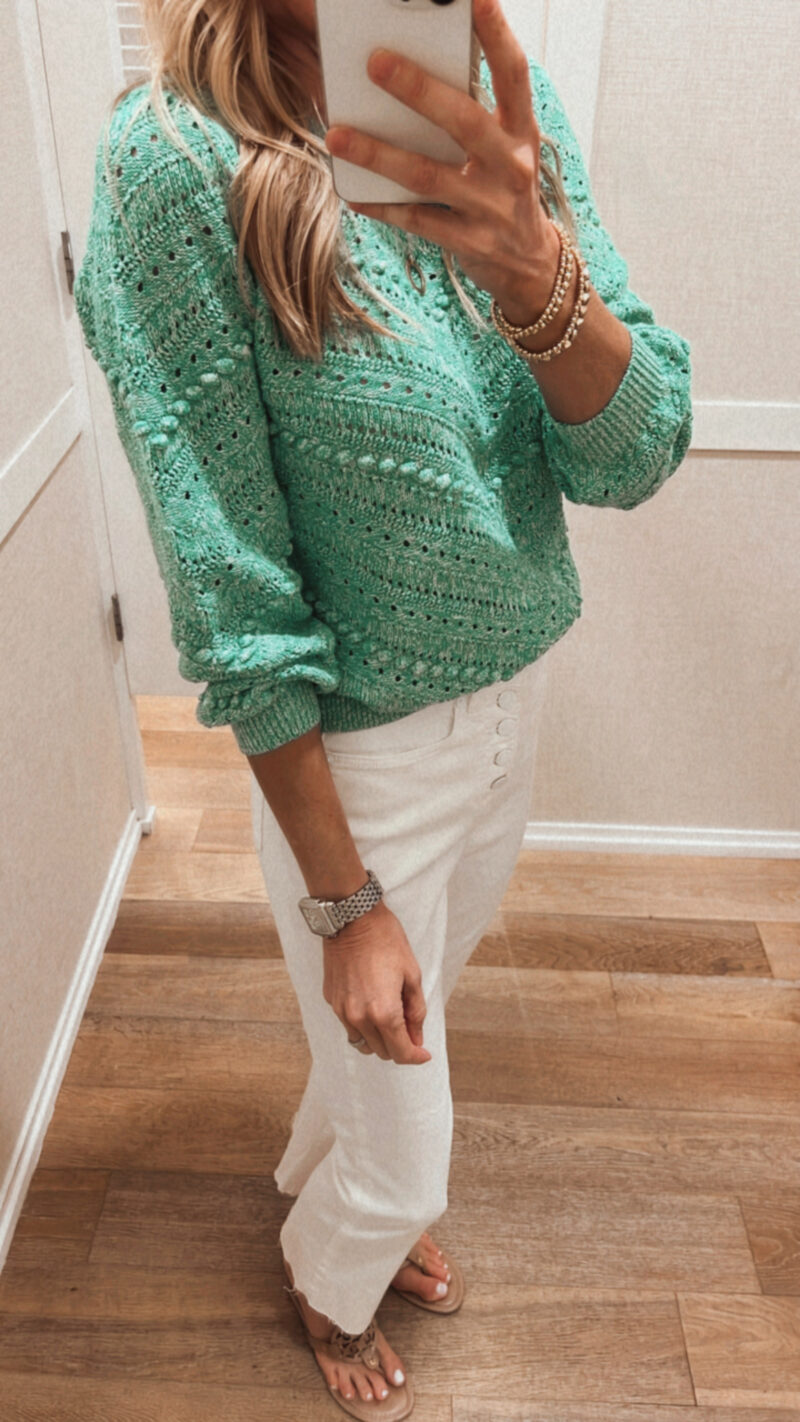 green pom sweater