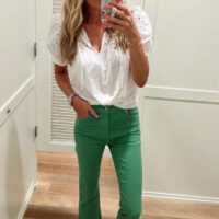 green pants white top