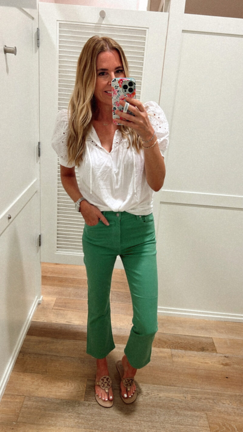 green pants white top